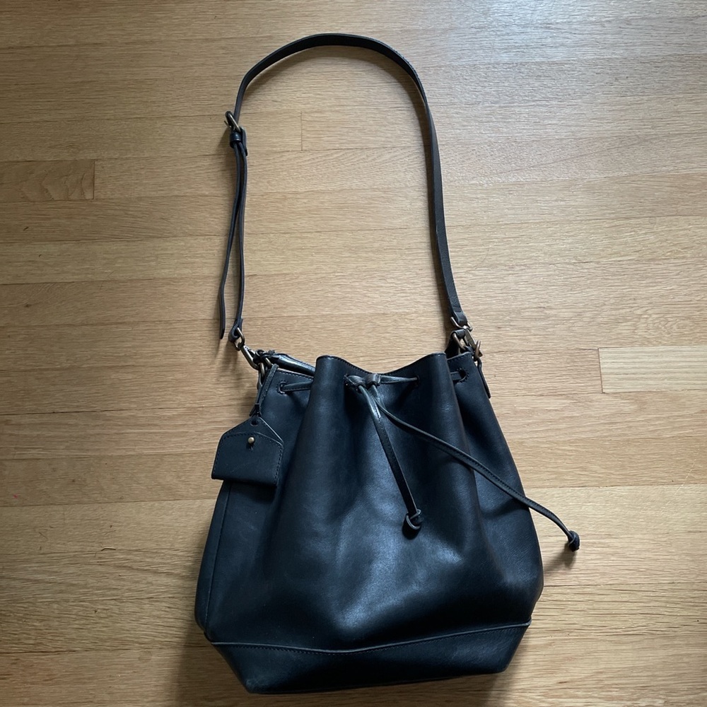 Black leather bucket bag and over the shoulder purse